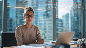 Professional woman working in U.S. office with E-2 dependent spouse work authorization